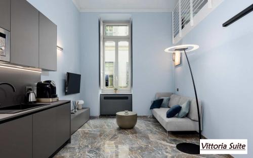 Kuchyň nebo kuchyňský kout v ubytování Q71 TIMELESS SUITES