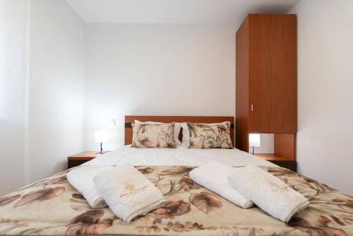 Postel nebo postele na pokoji v ubytování Casa da Petisqueira 54, Paredes-Oporto