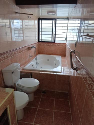 Koupelna v ubytování acuario residencial 2