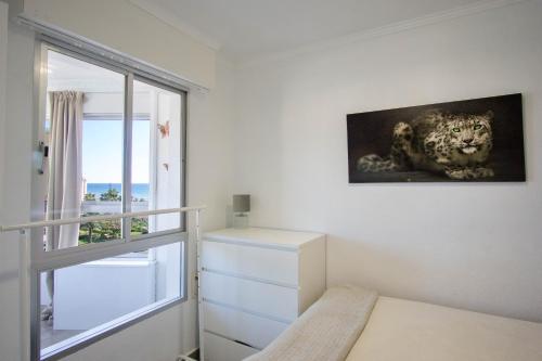 Posteľ alebo postele v izbe v ubytovaní Modern apartment with a wonderful sea view