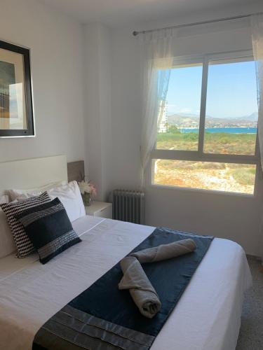 Postel nebo postele na pokoji v ubytování Cabo Mar