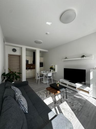 Coin salon dans l'établissement Modernes Apartment am Marienplatz