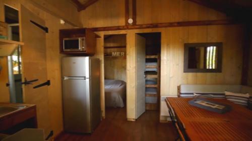 Dapur atau dapur kecil di Lodging Le Lac