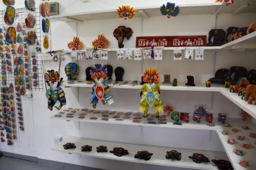 a store with shelves filled with different types of items at Cinnamon Mantra Luxury Villa in Beruwala