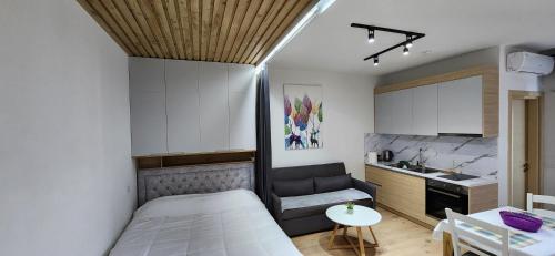 Кровать или кровати в номере Avalona Apartment 2