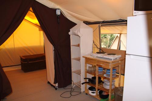 Televisyen dan/atau pusat hiburan di Lodging Le Lac