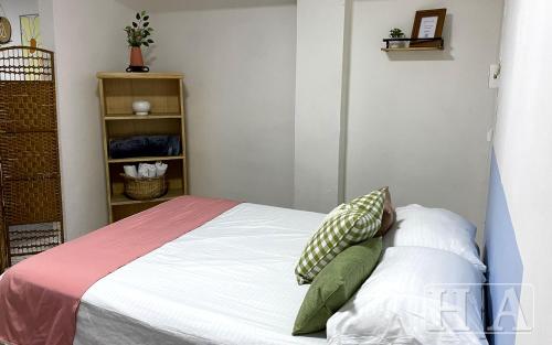 Postel nebo postele na pokoji v ubytování Hospedaje Aldana - Apartamento AMAL zona centro