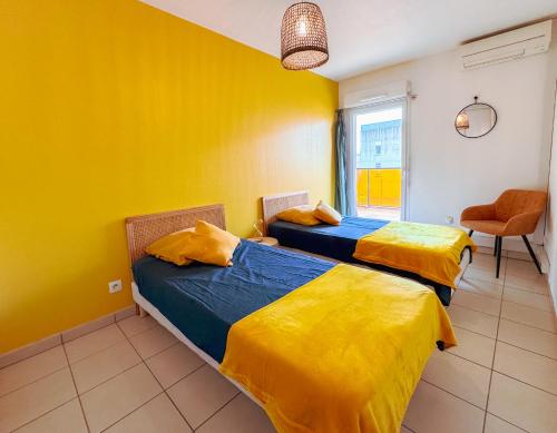 Posteľ alebo postele v izbe v ubytovaní Bel appartement climatisé & parking