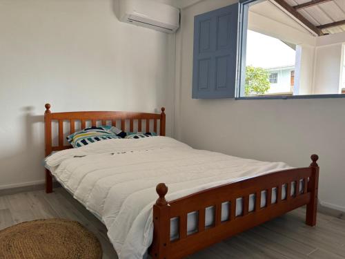Llit o llits en una habitació de Yanami T2