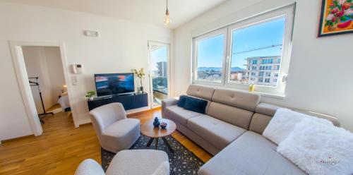 Lucy Apartment 1にあるテレビまたはエンターテインメントセンター