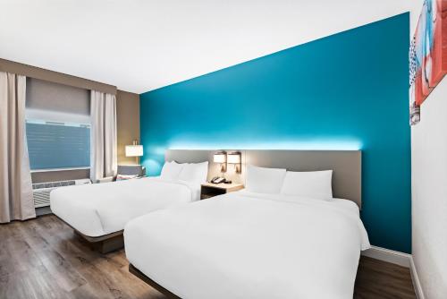 Katil atau katil-katil dalam bilik di Comfort Inn & Suites