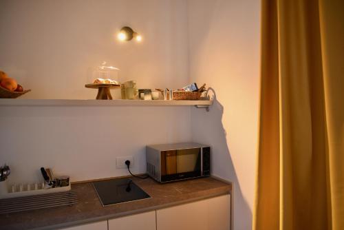 Dapur atau dapur kecil di Nine Rooms Apartment