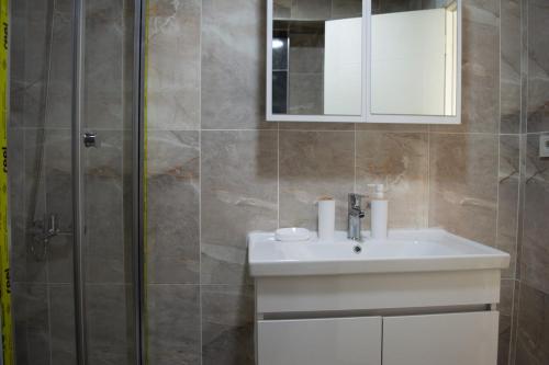Ένα μπάνιο στο Luxe Suite AY37