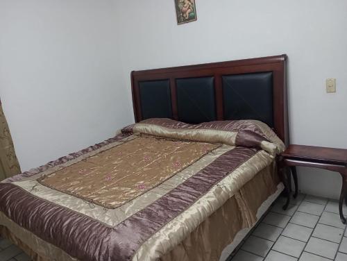 Postel nebo postele na pokoji v ubytování Departamento el REPOSO