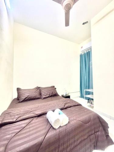 Ένα ή περισσότερα κρεβάτια σε δωμάτιο στο H&Z Guesthouse Kulim Hi-Tech - Free Wifi - Netflix