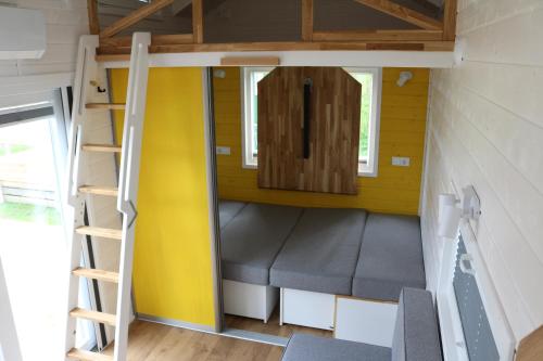 Postel nebo postele na pokoji v ubytování Tinyhouse Horssen