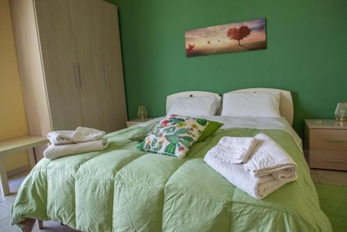 Postel nebo postele na pokoji v ubytování B&B LAVIKA PEDARA