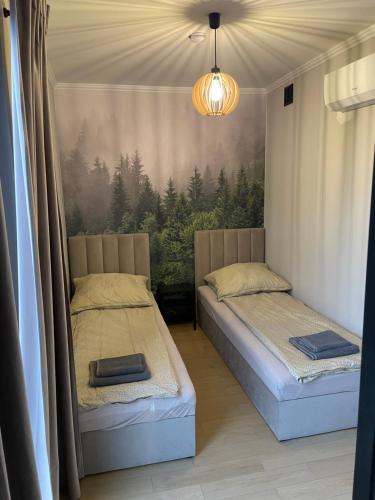 Postel nebo postele na pokoji v ubytování Kontener 15G