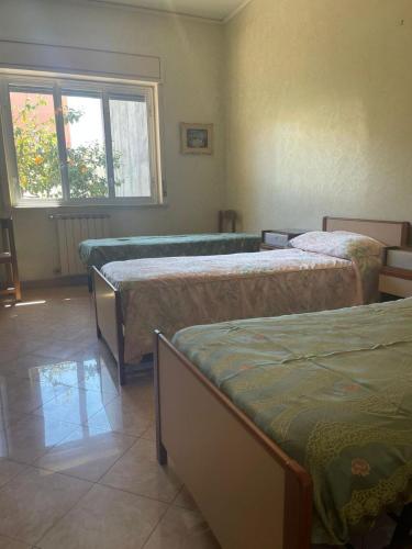Ένα ή περισσότερα κρεβάτια σε δωμάτιο στο Mylae House