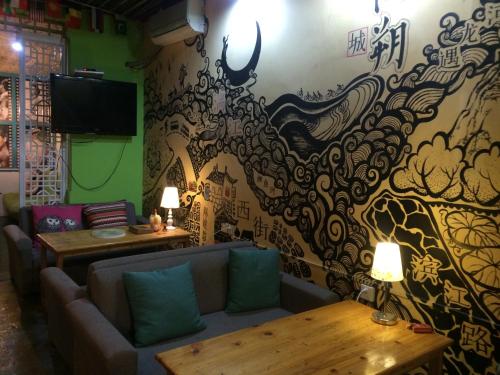 Posezení v ubytování How Flowers Hostel & Party Coliving Coworking Nomad