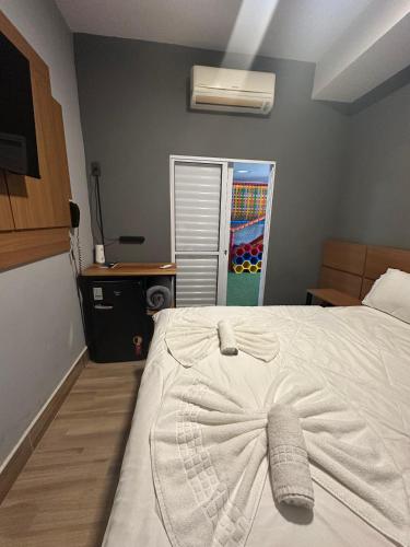 Postel nebo postele na pokoji v ubytování Hotel La Serena