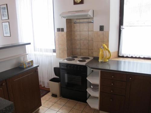 Koupelna v ubytování Guest House U Lakomce