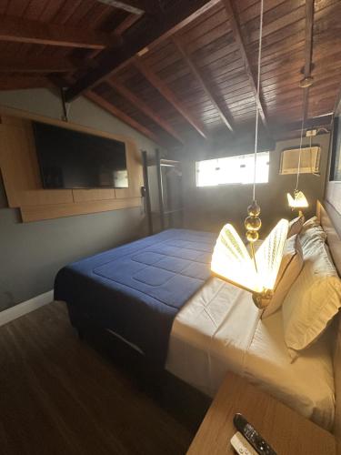 Postel nebo postele na pokoji v ubytování Hotel La Serena