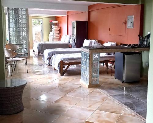Postel nebo postele na pokoji v ubytování Arranque Jungle & Pool Apartment Cerro Azul Panama