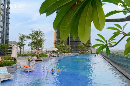 Πισίνα στο ή κοντά στο 1BR appartment at Lumiere Riverside, city view free pool