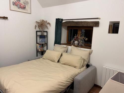 Cama o camas de una habitación en La Bergerie du Manoir de Kercassier Guérande