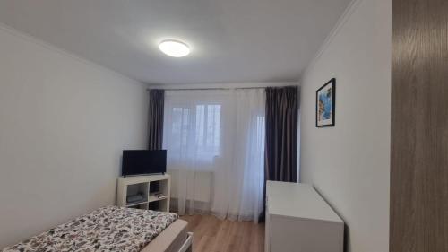 TV a/nebo společenská místnost v ubytování Camere Anita