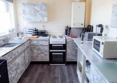 Dapur atau dapur kecil di Seacroft at Botany Bay Sleeps 6-8
