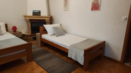 Ένα ή περισσότερα κρεβάτια σε δωμάτιο στο House Bogović