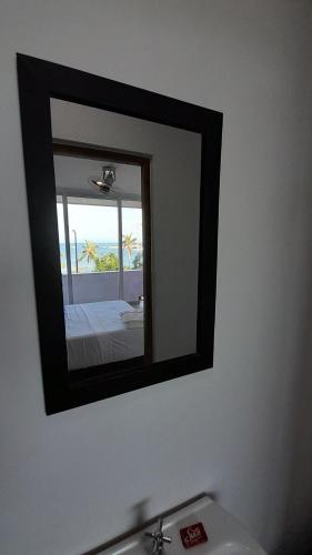 Una cama o camas en una habitación de Panamerican Hostel