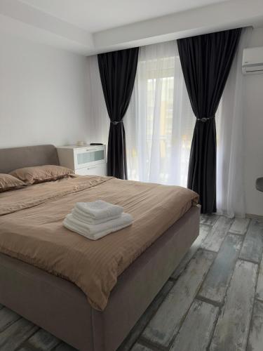 Llit o llits en una habitació de Summer cosmopolis