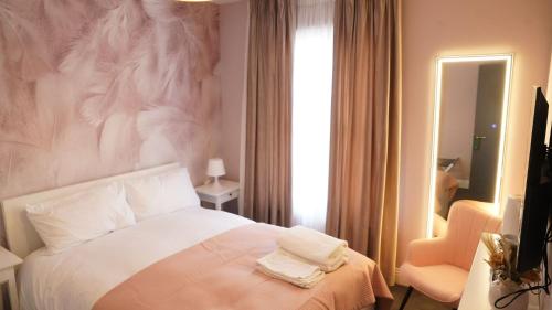 Ένα ή περισσότερα κρεβάτια σε δωμάτιο στο Mandeville Guest House