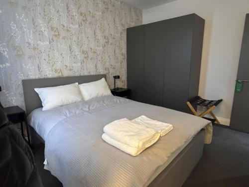 Ένα ή περισσότερα κρεβάτια σε δωμάτιο στο Mandeville Guest House