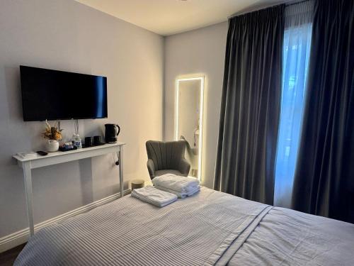 Ένα ή περισσότερα κρεβάτια σε δωμάτιο στο Mandeville Guest House