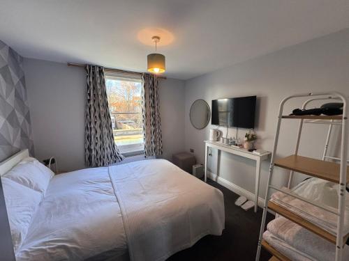 Ένα ή περισσότερα κρεβάτια σε δωμάτιο στο Mandeville Guest House
