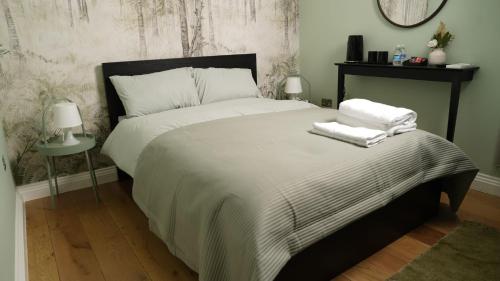 Ένα ή περισσότερα κρεβάτια σε δωμάτιο στο Mandeville Guest House