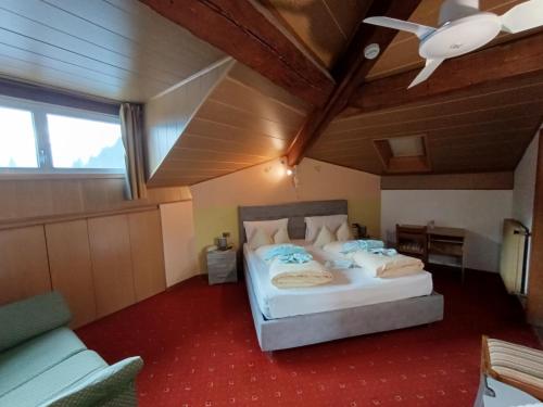 Postel nebo postele na pokoji v ubytování Hotel Residence Rosa