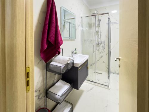 Et badeværelse på Eden Apartment