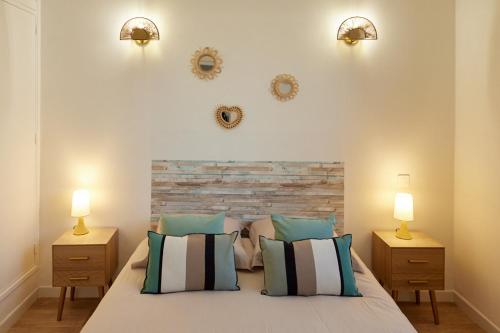 Ένα ή περισσότερα κρεβάτια σε δωμάτιο στο Coquet T2 pres des plages