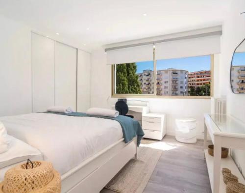 Katil atau katil-katil dalam bilik di Appartement luxueux 110m collé au prestigieux hôtel le MARTINEZ
