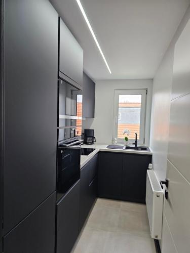 Kuchyň nebo kuchyňský kout v ubytování Moderne 3 Zimmer Wohnung