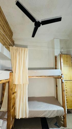 Postel nebo postele na pokoji v ubytování Yaya Casa