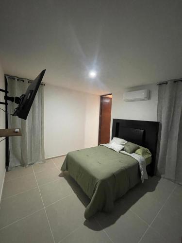 Itzamná Houseにあるベッド