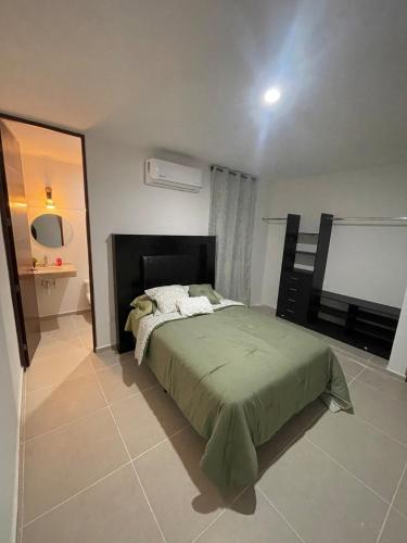 Itzamná Houseにあるベッド