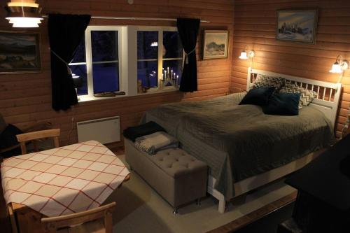 Postel nebo postele na pokoji v ubytování Åviken Cabin