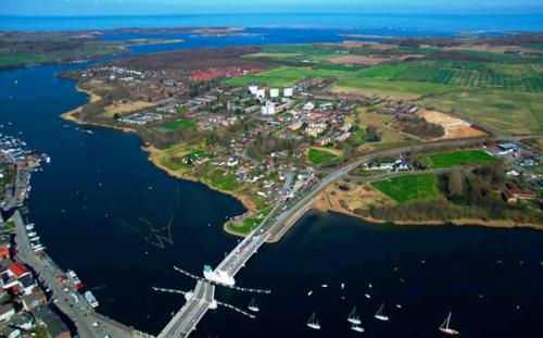 an aerial view of a bridge over a body of water at Hotel Zur Mühle in Kappeln